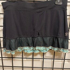 Sofibella Black, Teal and light melon colored ruffle skirt.
